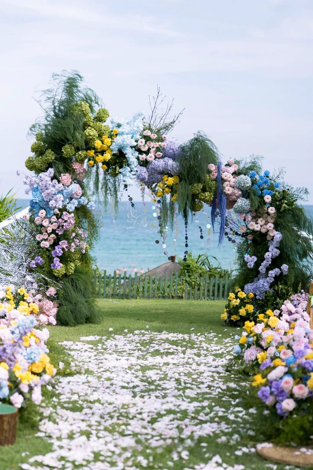 Dreamy Tropical Island Wedding Inspiration with Colorful Floral Arch and Oceanfront Romance
