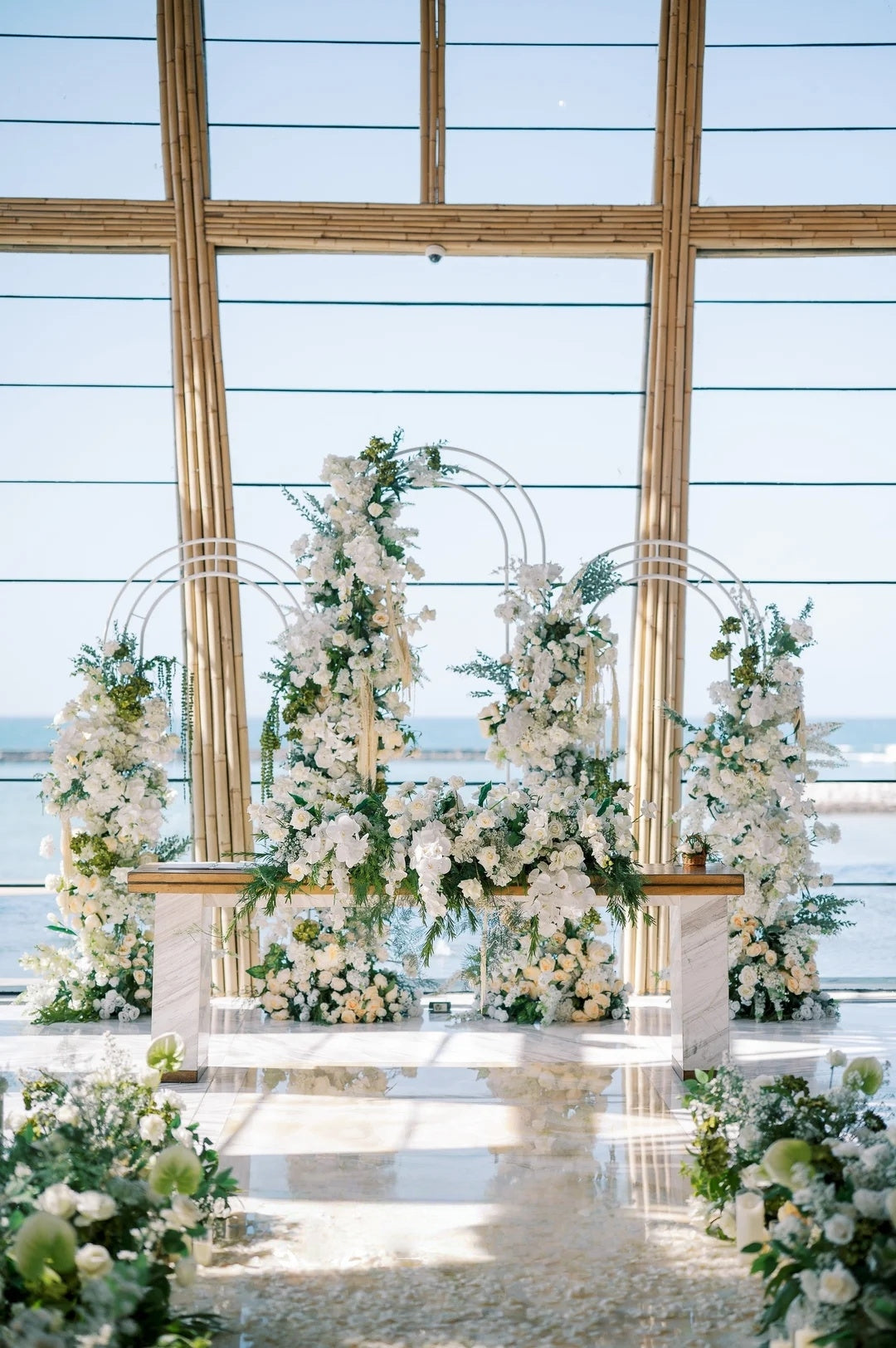 White Oceanfront Chapel Wedding Inspiration â Elegant All-White Floral Ceremony Design