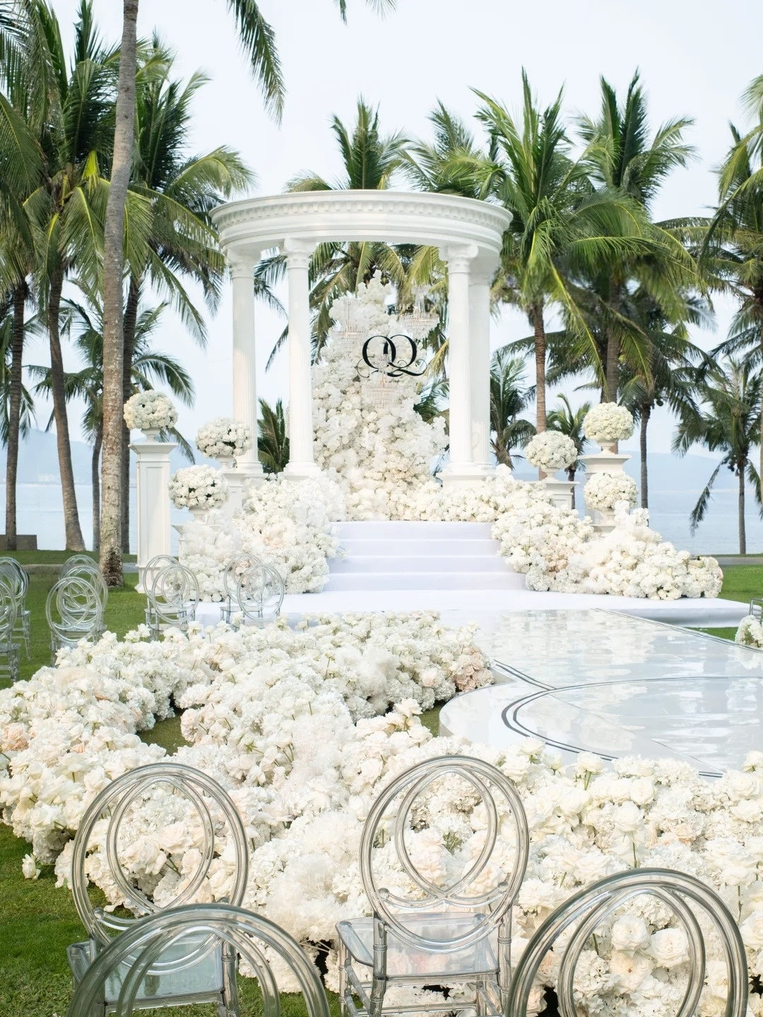 Luxury White Wedding Inspiration with Tropical Ocean Views and Elegant Floral Design
