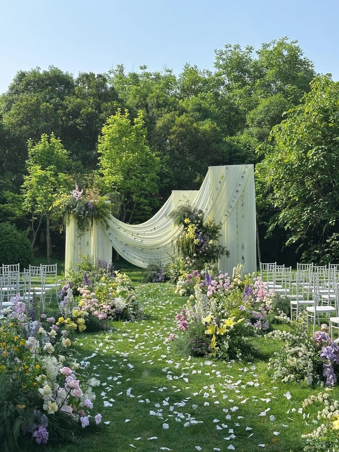 Wild Garden Wedding Inspiration with Soft Draping and Natural Floral Arrangements