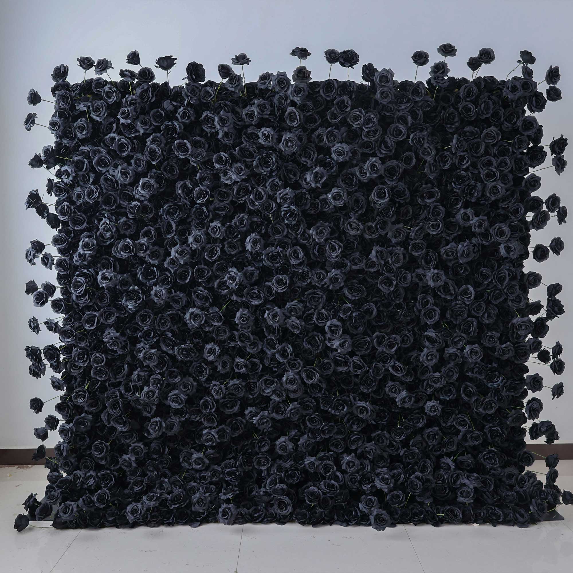 Handcrafted 5D artificial flower wall backdrop with deep black roses, set against a light background. Perfect for weddings, themed events, and stylish photoshoots, creating a bold and mysterious setting VF-404-3-1