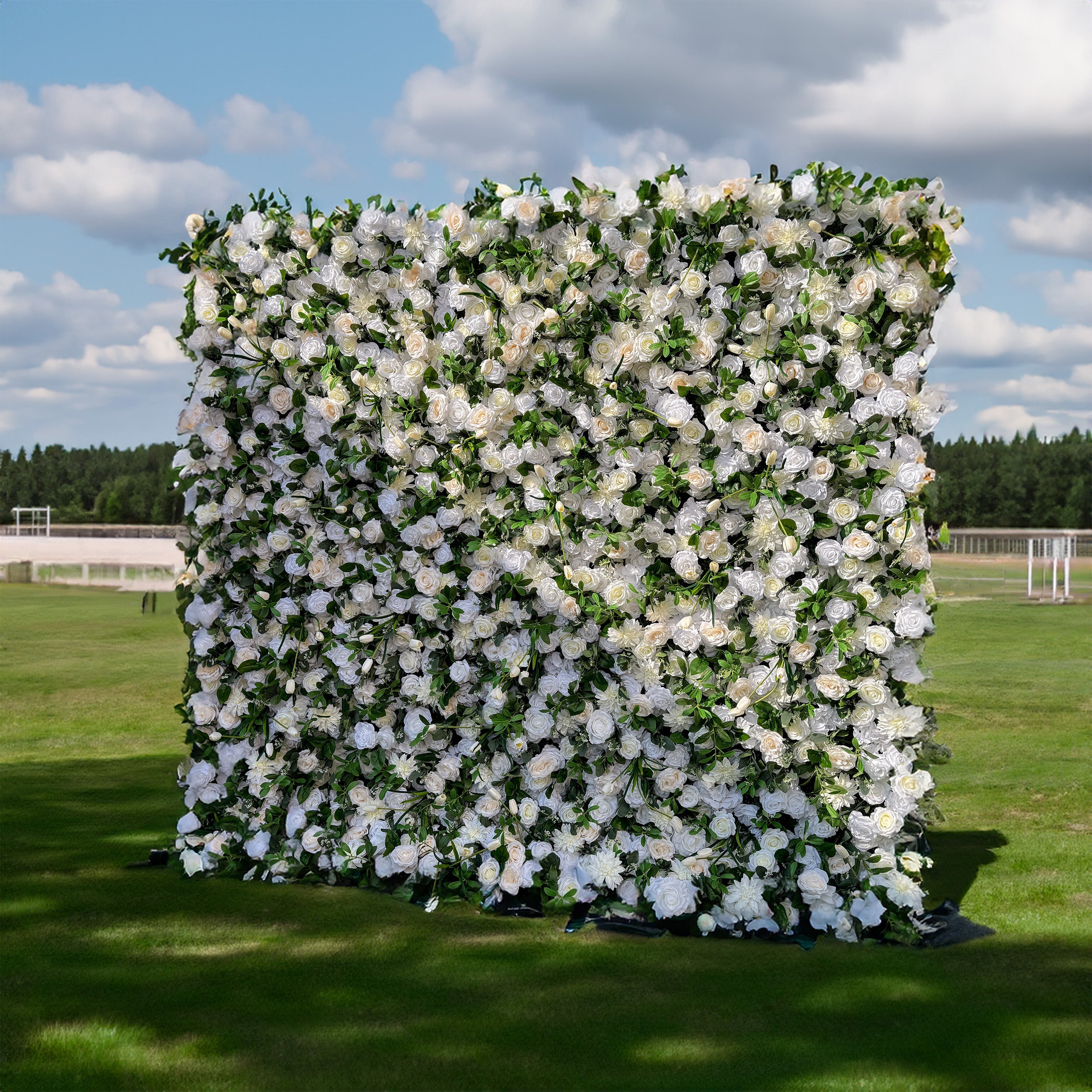 This artificial flower wall is 2.4m x 2.4m. It is filled with numerous white roses and green leaves, looking luxurious. The materials are of high - quality, ensuring durability. It's easy to set up and can be used for various events like weddings. Compared to fresh flowers, it is more cost - effective and requires less maintenance.