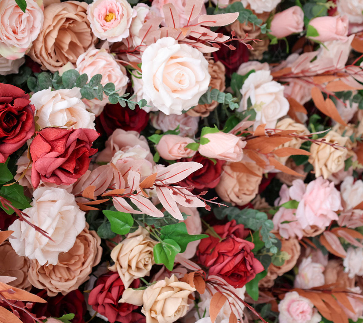 Handcrafted 5D artificial flower wall backdrop with a mix of blush, cream, earthy brown, and red roses, set against a light background. Ideal for weddings, rustic-themed events, and romantic settings.VF-405-4