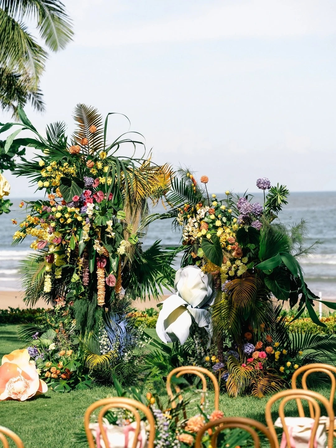 Tropical Beach Wedding Inspiration with Bold Florals and Palm Leaf Styling