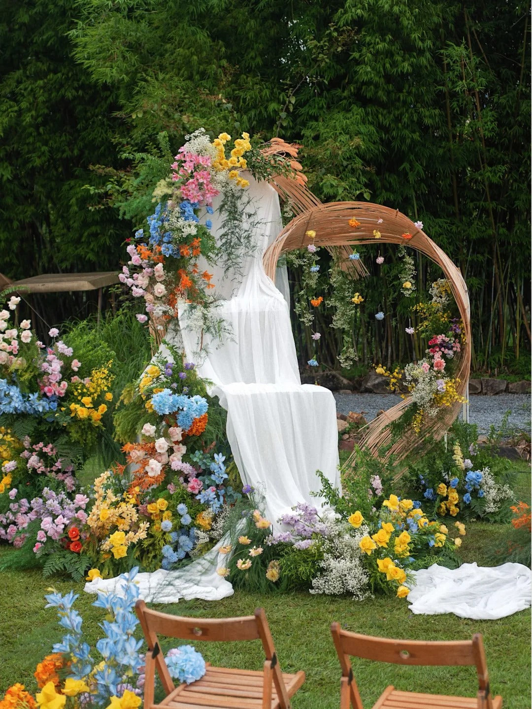Garden Wedding Inspiration with Colorful Florals and Natural Bamboo Ceremony Decor