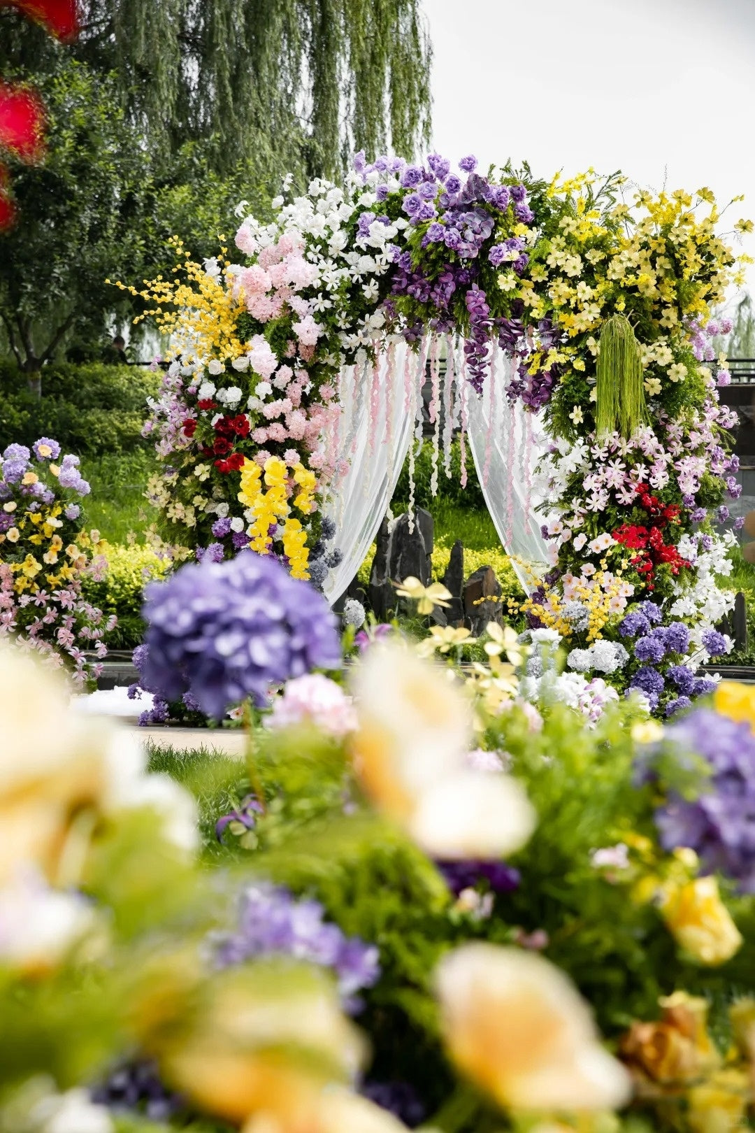 Spring Garden Wedding Inspiration with Colorful Floral Arch and Romantic Outdoor Details
