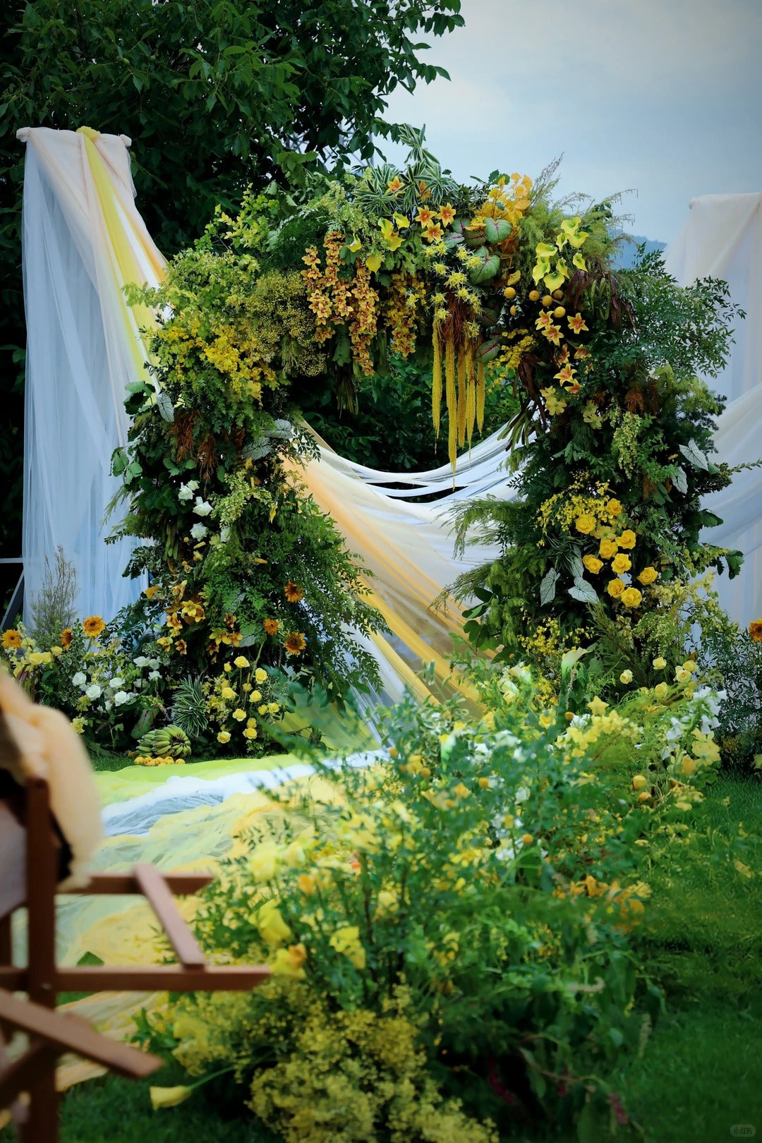 Yellow Garden Wedding Inspiration with Lush Greenery and Soft Draping