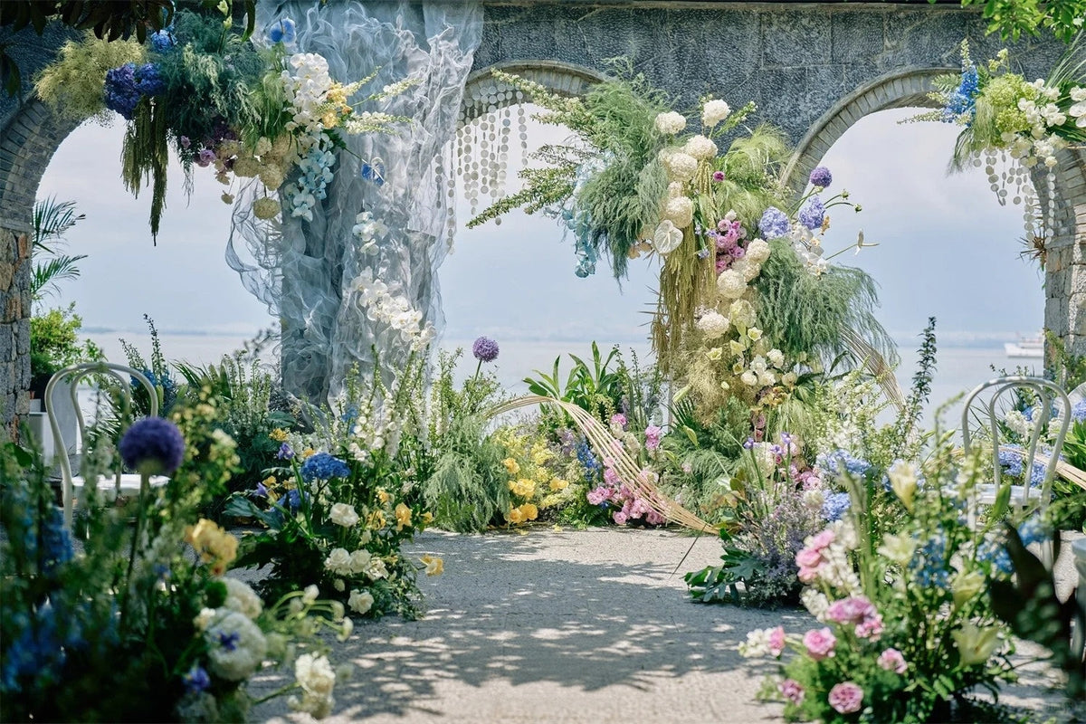A Romantic Garden Wedding Beneath Timeless Stone Arches