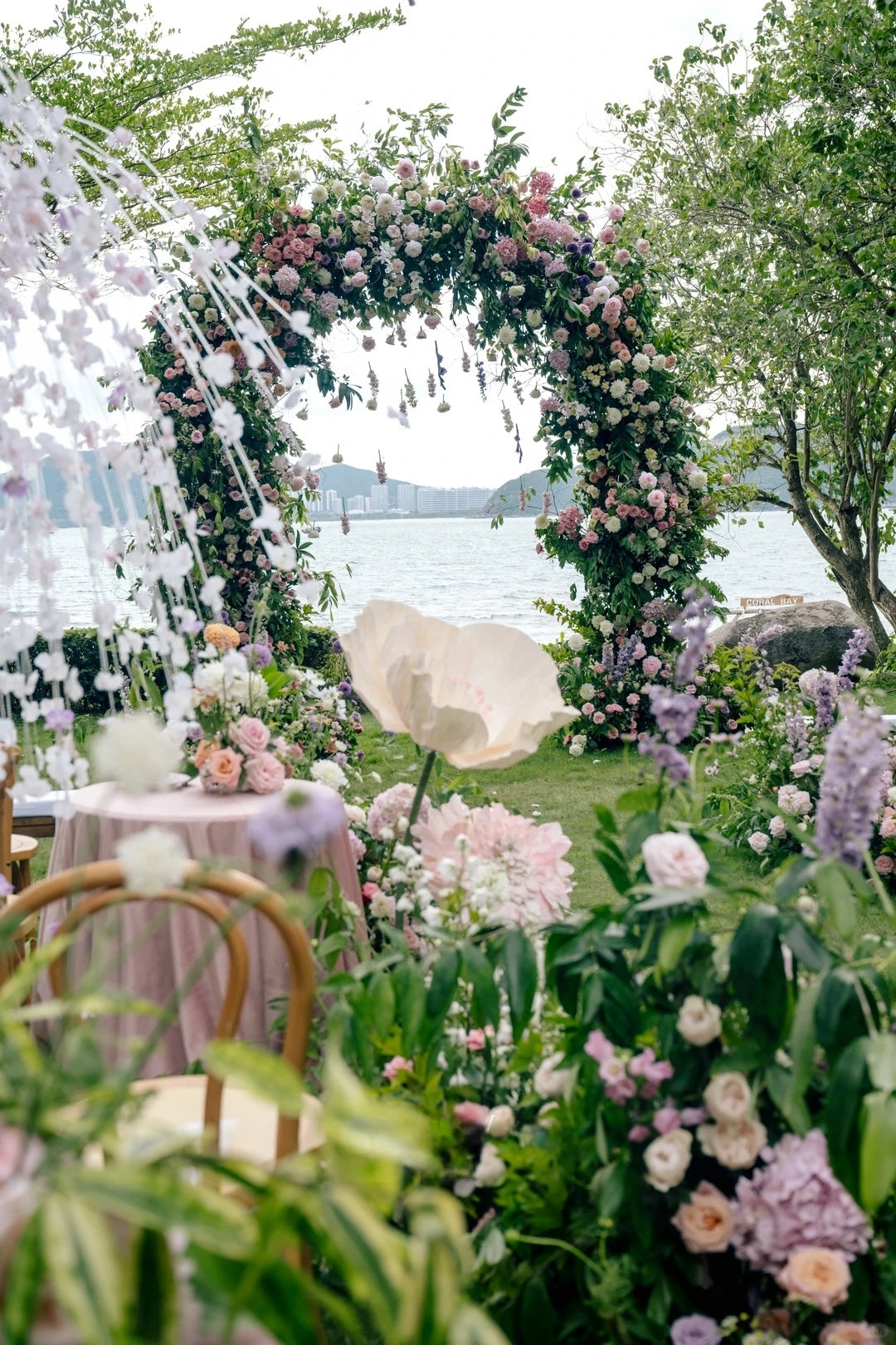 Garden by the Sea Wedding Inspiration: A Romantic Floral Arch Ceremony with Soft Pastel Details