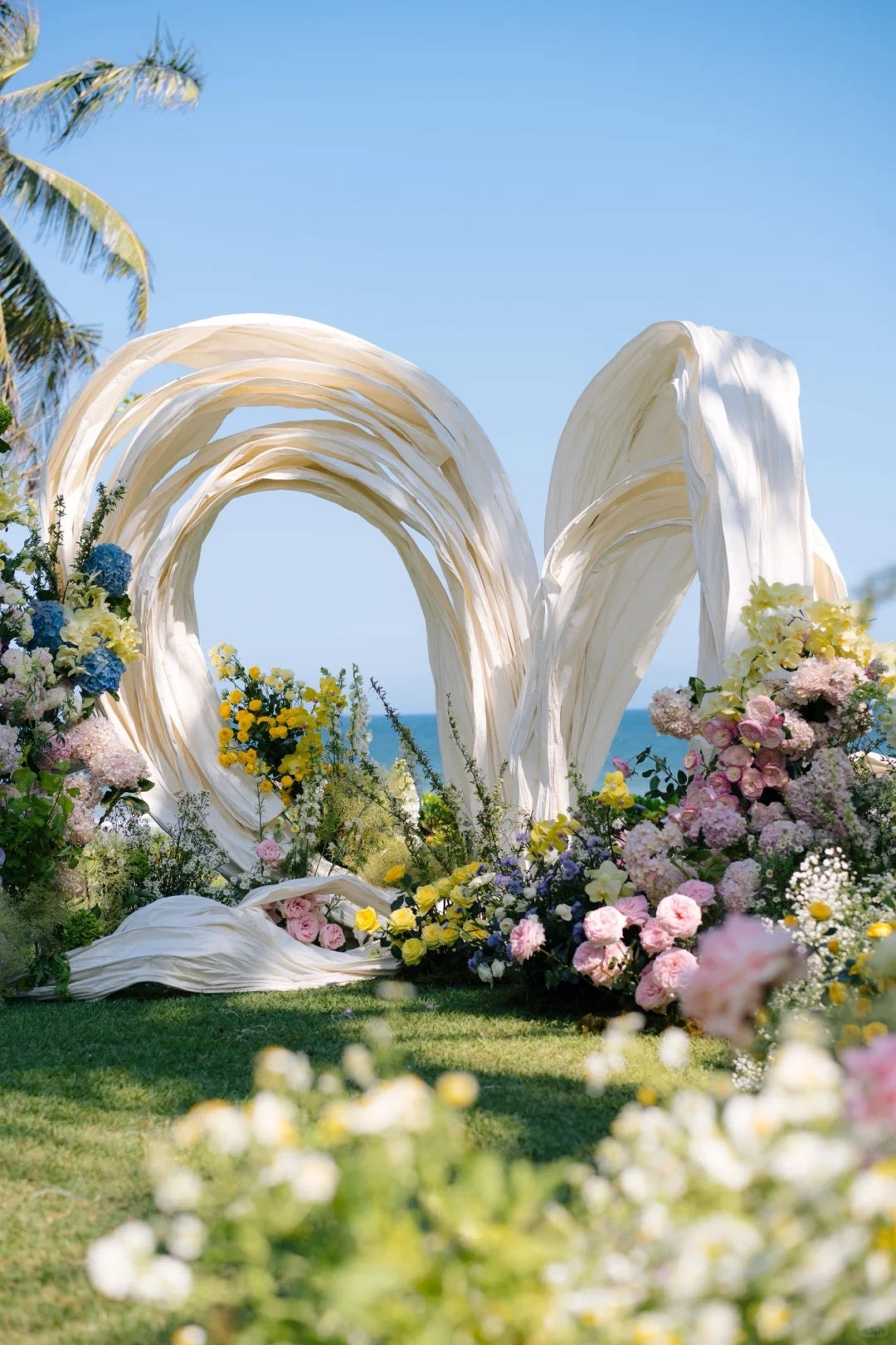🌊 Seaside Monet Garden Wedding Inspiration with Sculptural Draping and Colorful Floral Romance