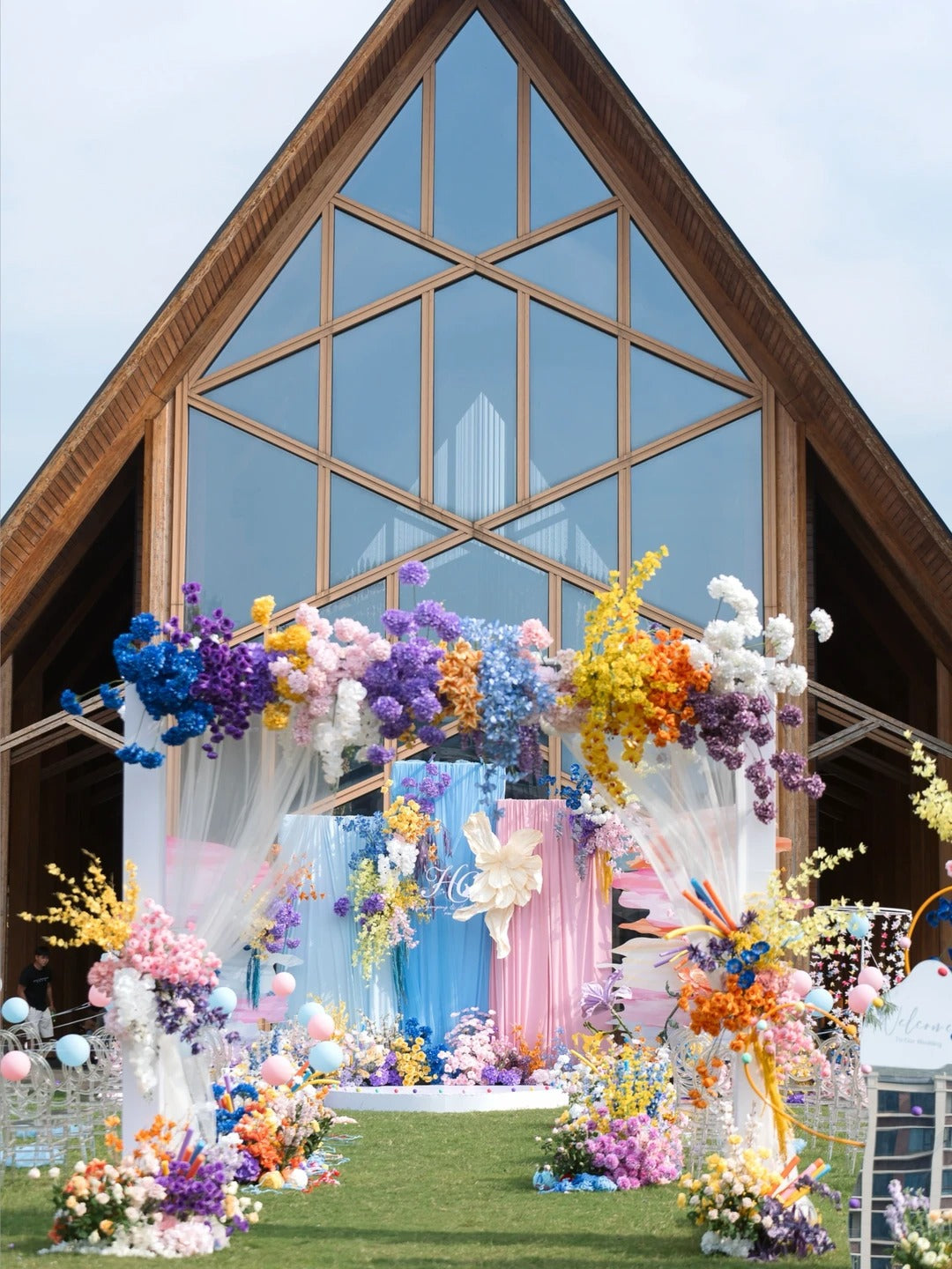 Colorful Dopamine Wedding Inspiration with Blue Pink Draping and Bright Floral Decor