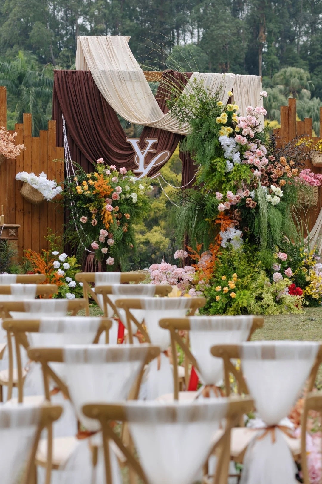 Mocha Brown Outdoor Wedding Inspiration with Rustic Wood Backdrop and Garden Florals