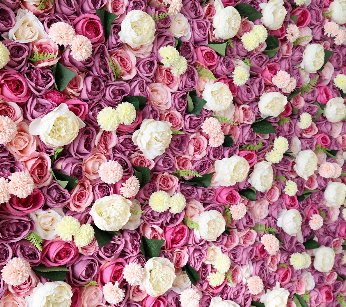 Handcrafted 5D artificial flower wall backdrop with a mix of pink, cream, and blush roses, accented with green leaves, set against a light background. Perfect for weddings, romantic events, and celebrations, creating a warm and inviting ambiance.VF-410-3