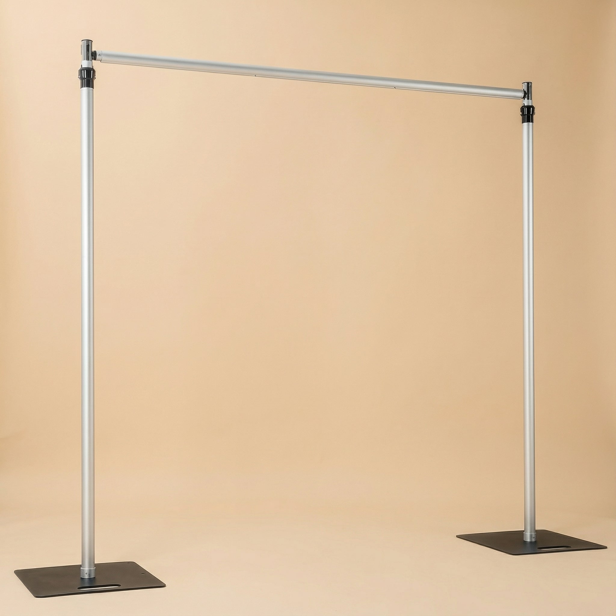Metal garment rack on a beige background