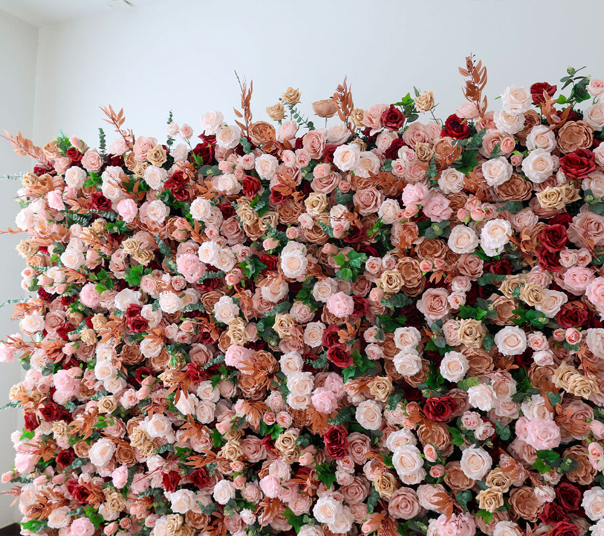 Handcrafted 5D artificial flower wall backdrop with a mix of blush, cream, earthy brown, and red roses, set against a light background. Ideal for weddings, rustic-themed events, and romantic settings.VF-405-3