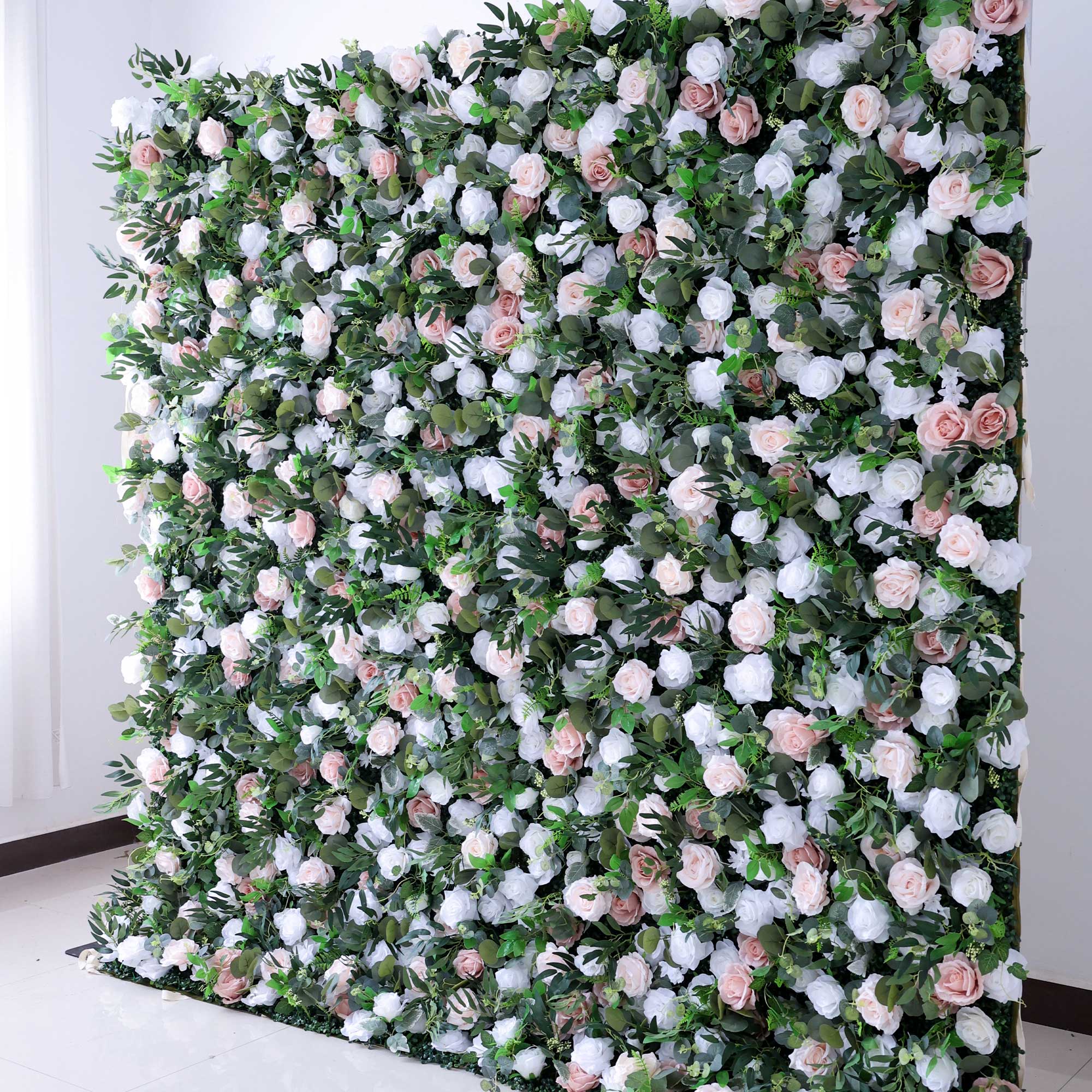 Handcrafted 5D artificial flower wall backdrop with blush pink and white roses, accented by rich greenery, set against a light background. Ideal for weddings, romantic events, and photoshoots, adding an elegant and graceful ambiance.VF-416-2