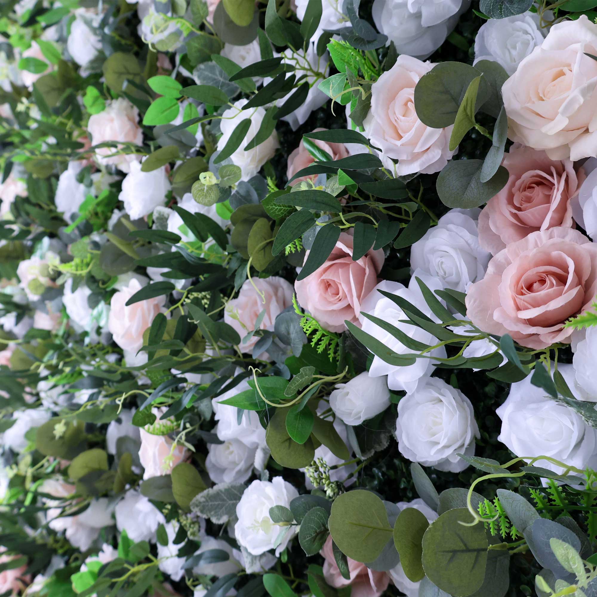 Handcrafted 5D artificial flower wall backdrop with blush pink and white roses, accented by rich greenery, set against a light background. Ideal for weddings, romantic events, and photoshoots, adding an elegant and graceful ambiance.VF-416-4