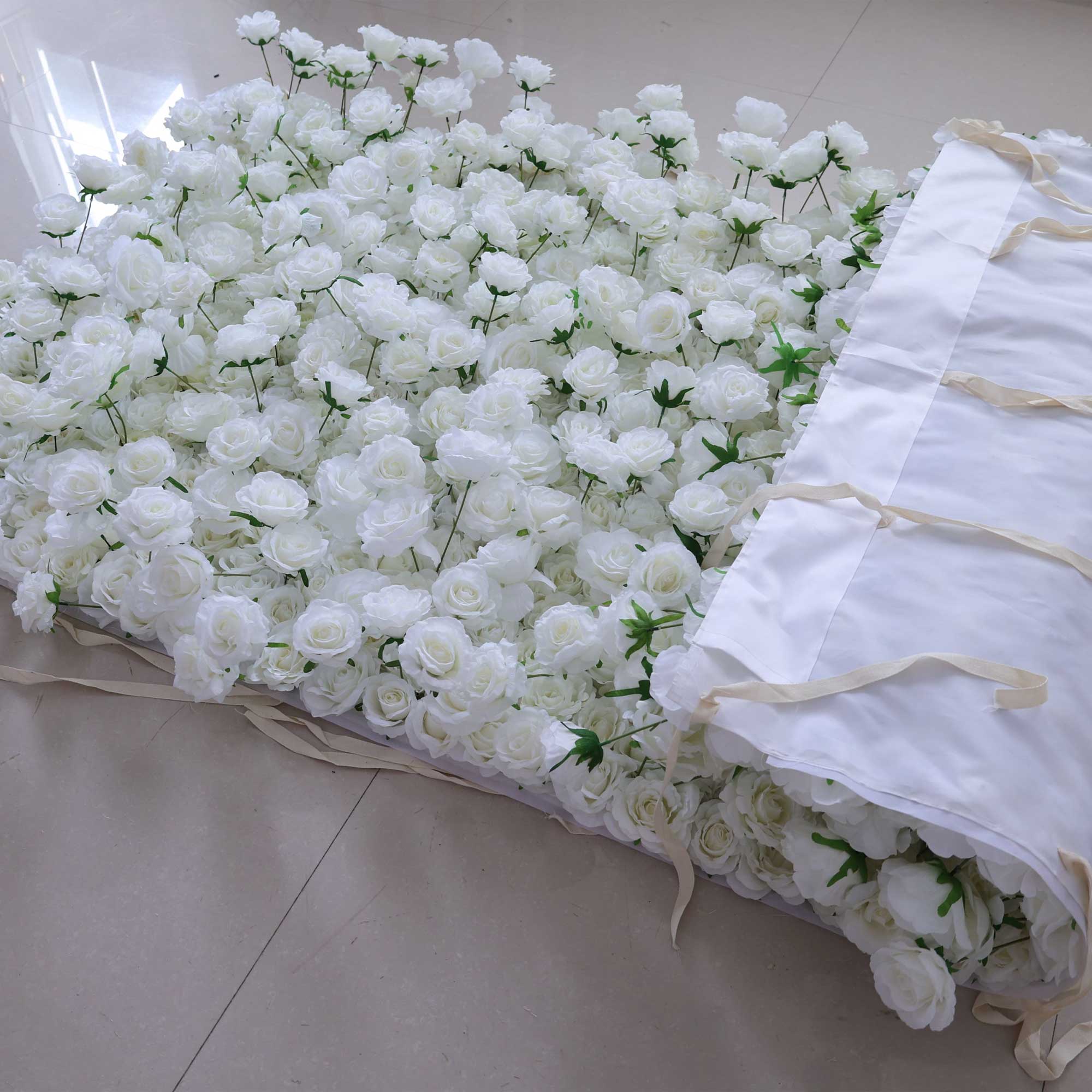 Handcrafted 5D artificial flower wall backdrop with pure white roses, set against a light background. Ideal for weddings, formal events, and photoshoots, providing a classic and elegant setting 404-2-3