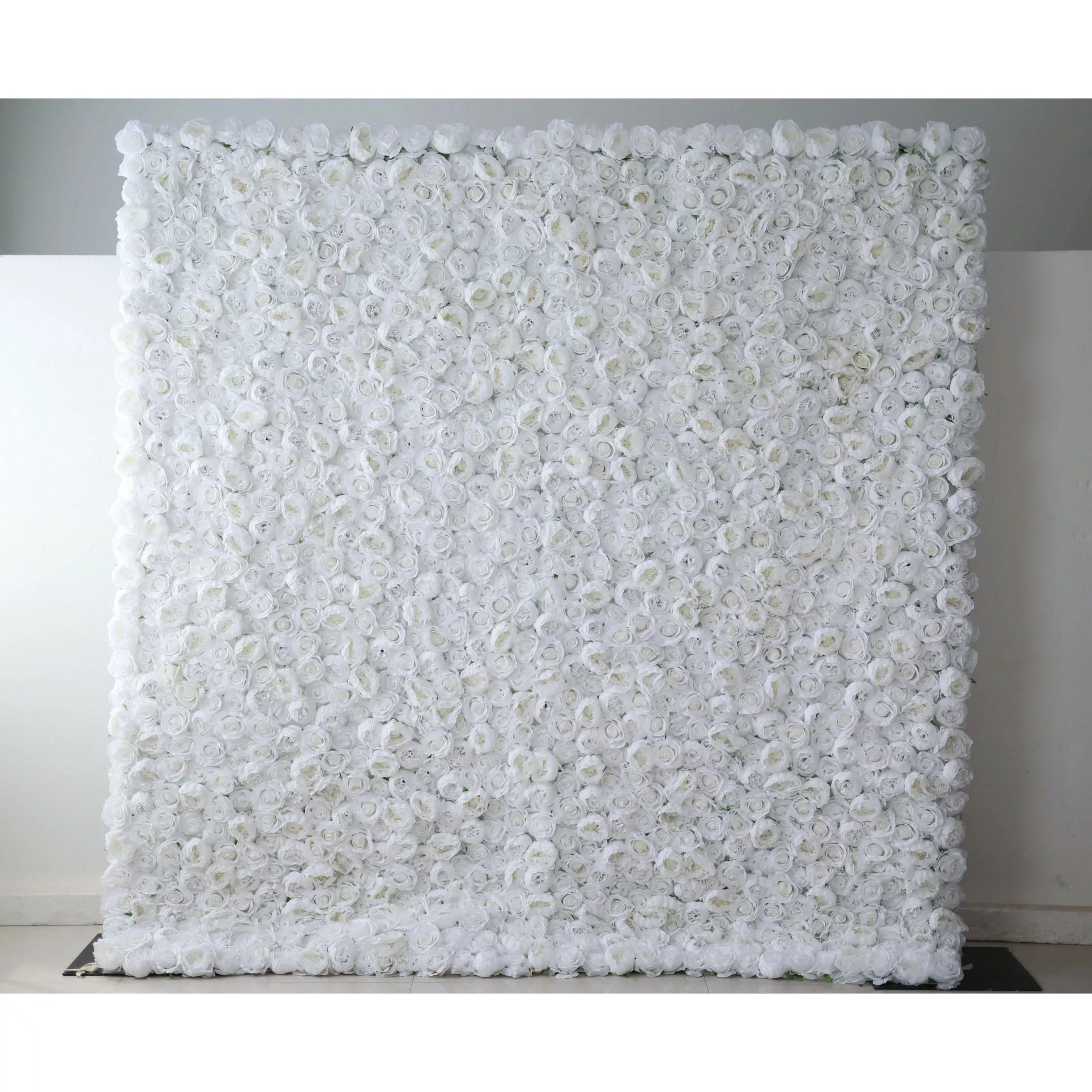 Valar Flowers' Artificial Fabric Flower Wall: White Blossom Bliss. A sea of densely packed white roses, projecting sophistication, timeless beauty, and pure romance, ideal for events cherishing elegance and captivating allure.