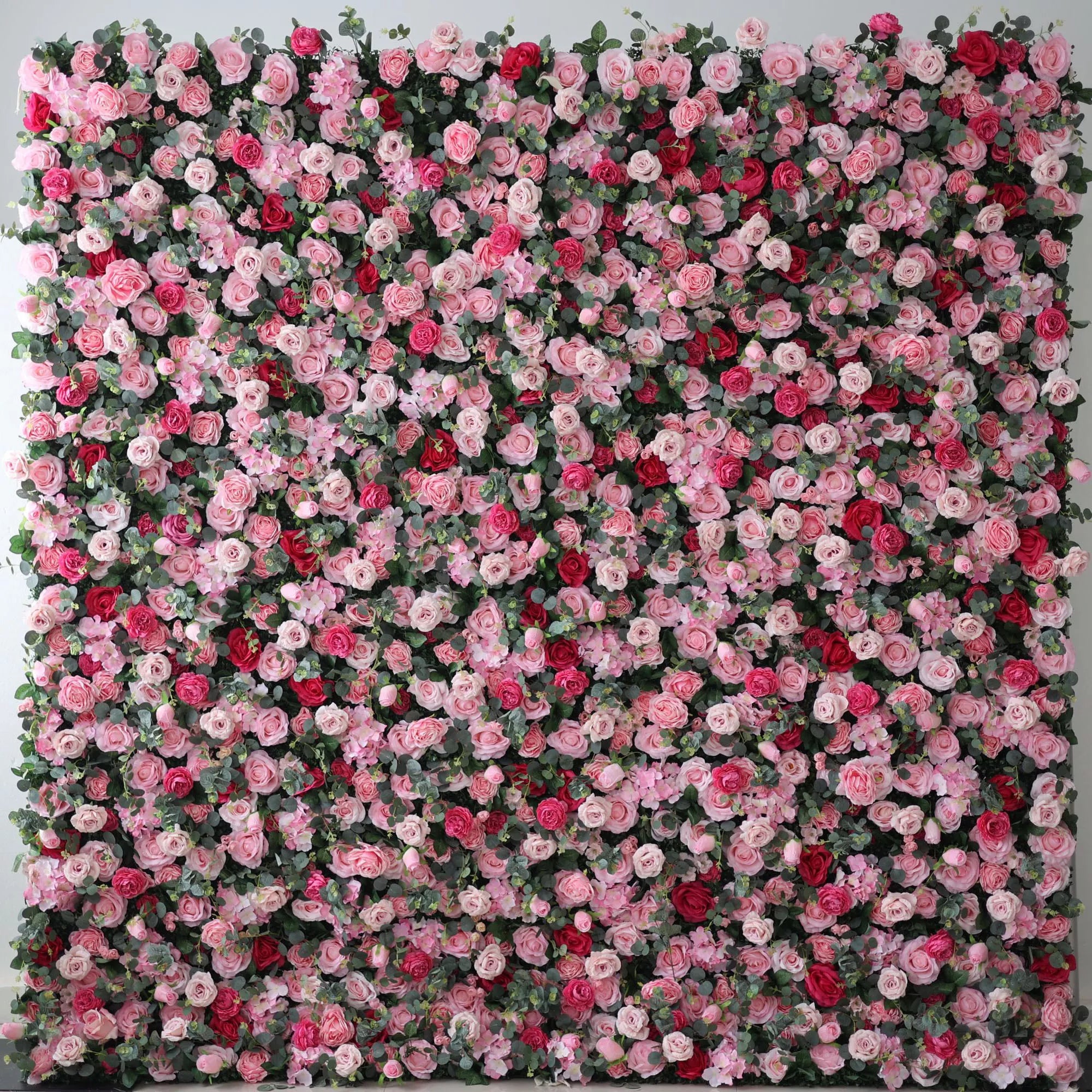 Valar Flowers' Artificial Fabric Flower Wall: Blooming Bliss. A stunning medley of pink, red, and white roses, beautifully set, creating an atmosphere of romance and botanical grandeur.