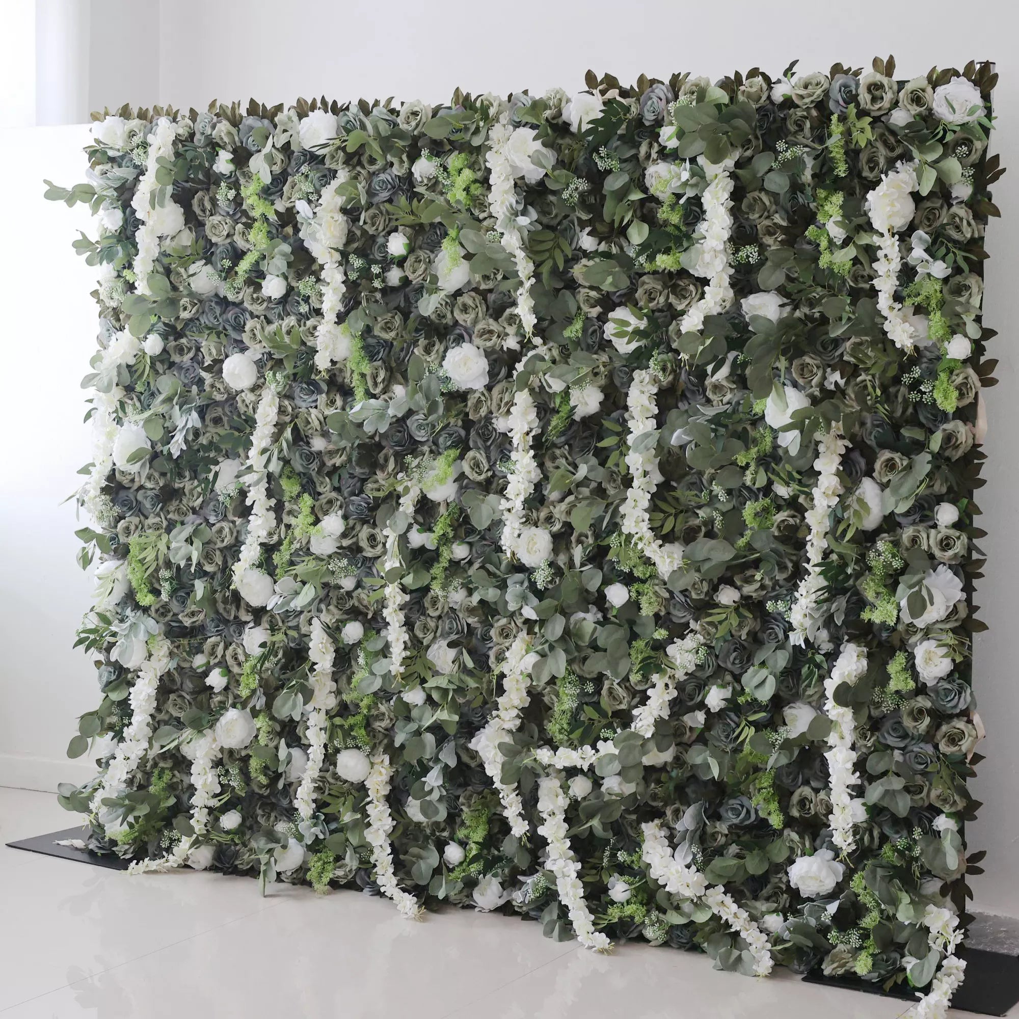 Valar Flowers' Verdant Elysium: A luxuriant blend of green foliage and cascading white blooms; perfect for an organic, eco-luxe ambiance in events and interiors.