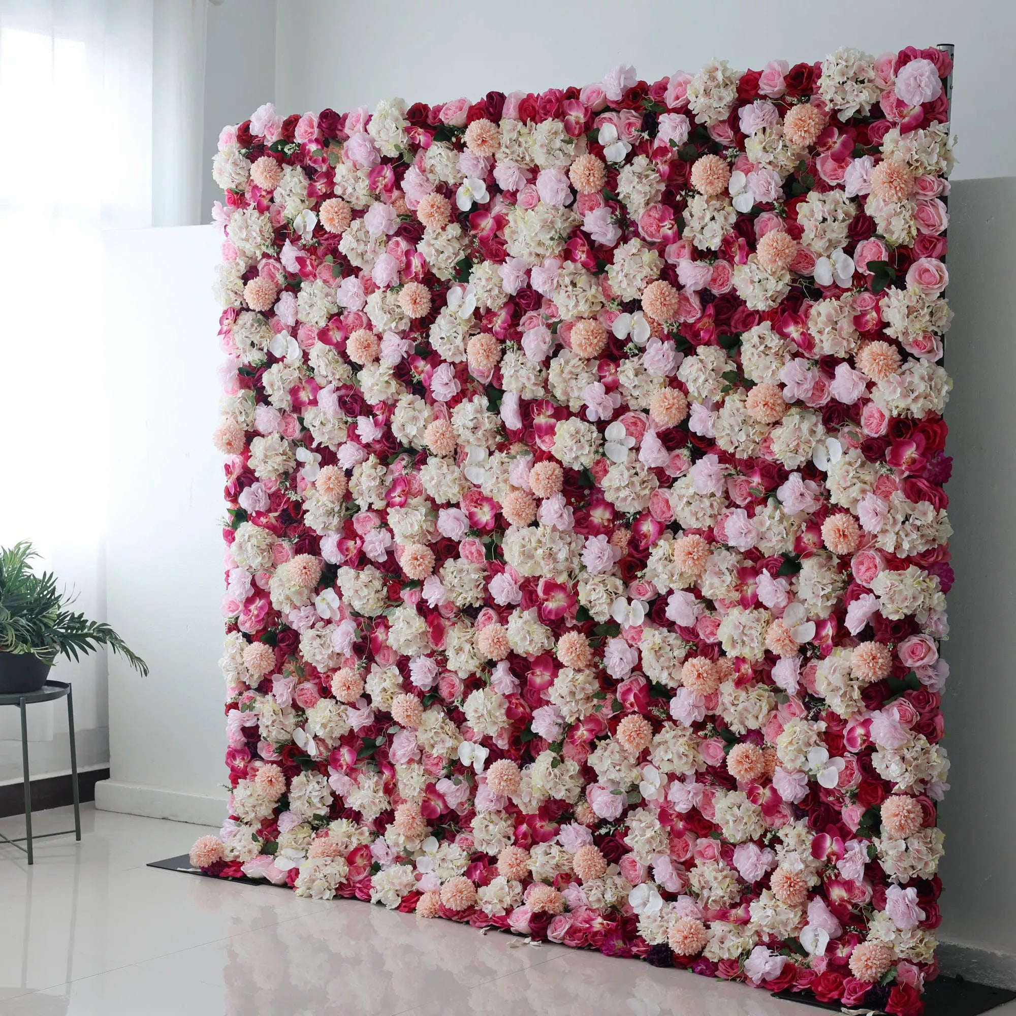 Valar Flowers Roll Up Backdrop: Immerse in the Roseate Radiance of blushing blooms. Ideal for romantic settings and elegant events, this backdrop weaves tenderness with timeless elegance. Bask in Valar's blossoming beauty.