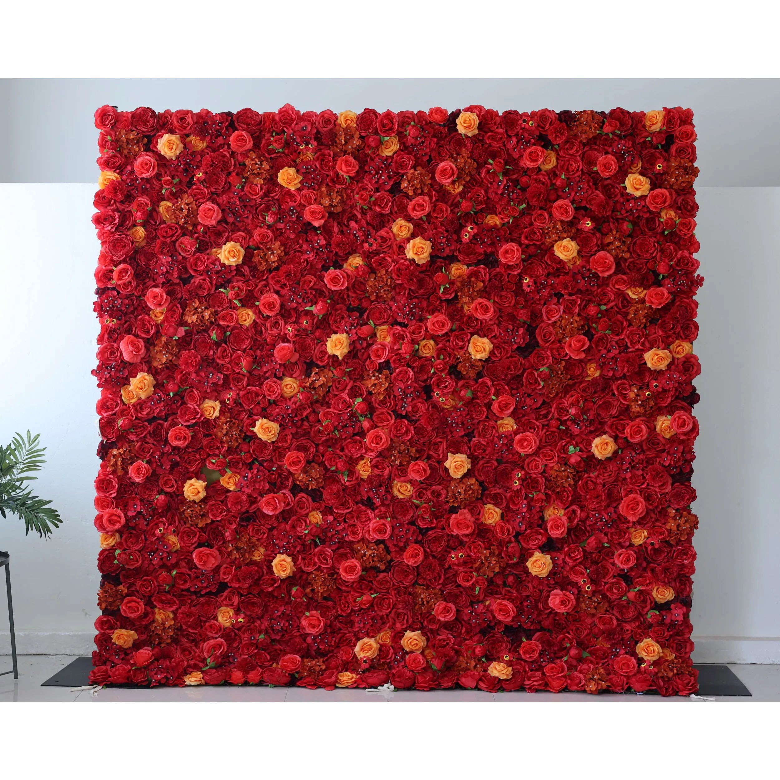 ValarFlowers Backdrop: Dive into Radiant Red Resplendence. A bold blend of reds with touches of gold. Ignite events with this lively, lush, and luxuriant floral fantasy.