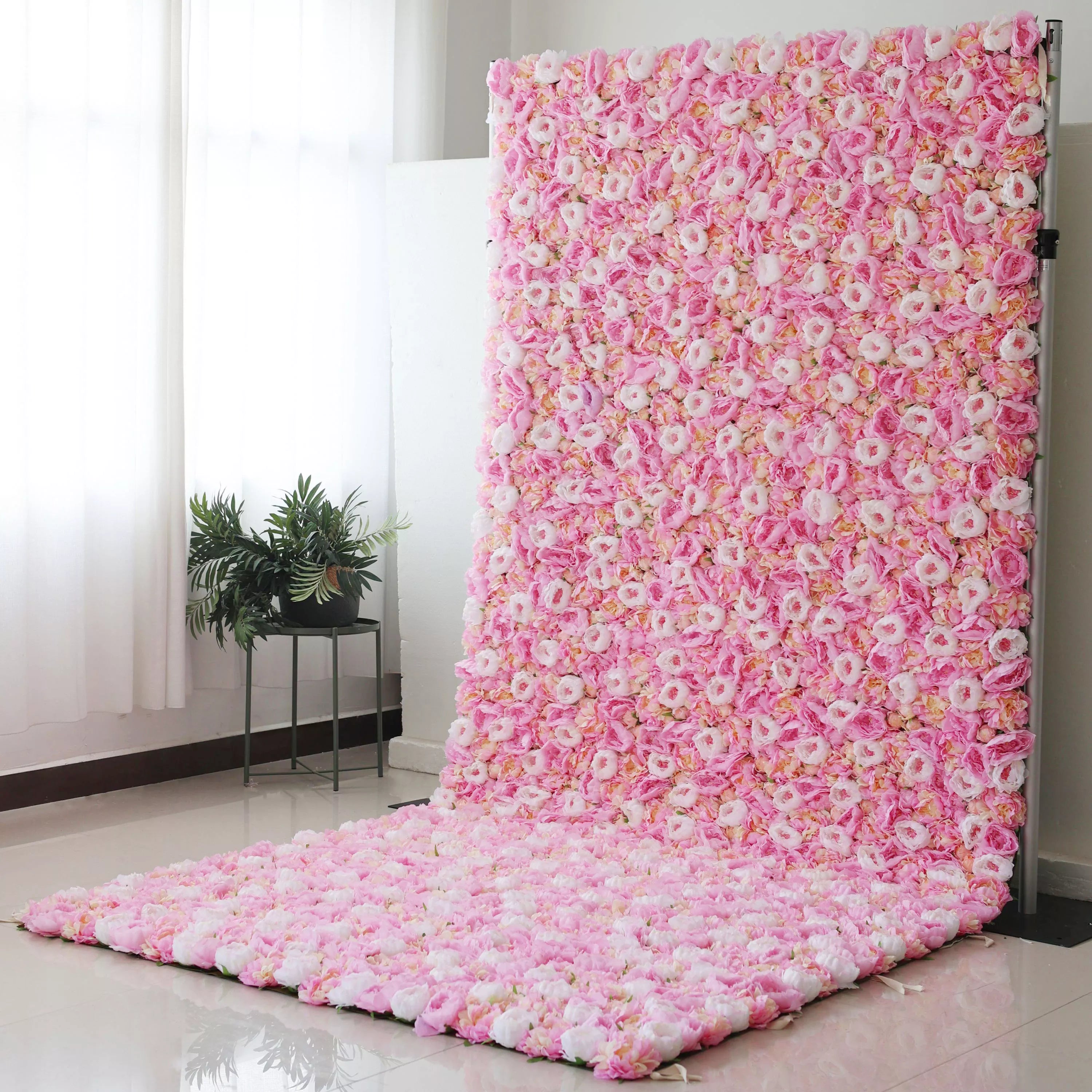 ValarFlowers Backdrop: A sea of soft pink petals, capturing the tenderness of nature. Ideal for adding a touch of elegance and warmth to any event.