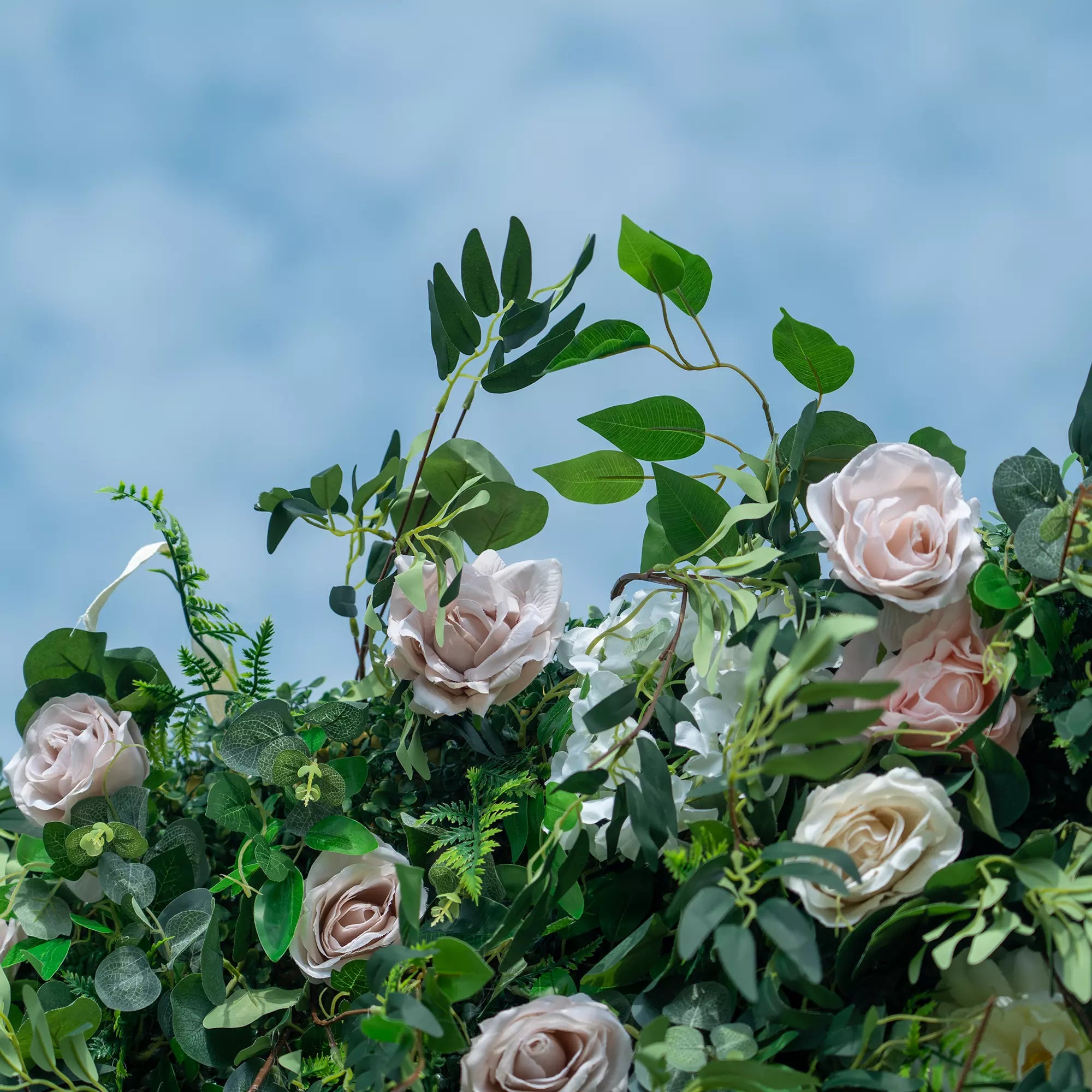 Elevate any event with the "Valar Flowers" Deluxe Floral Wall. Handcrafted with premium artificial roses, it's the ideal backdrop for memorable photos. Perfect for weddings, parties & more. Durable & UV resistant. A blend of luxury & nature's beauty.