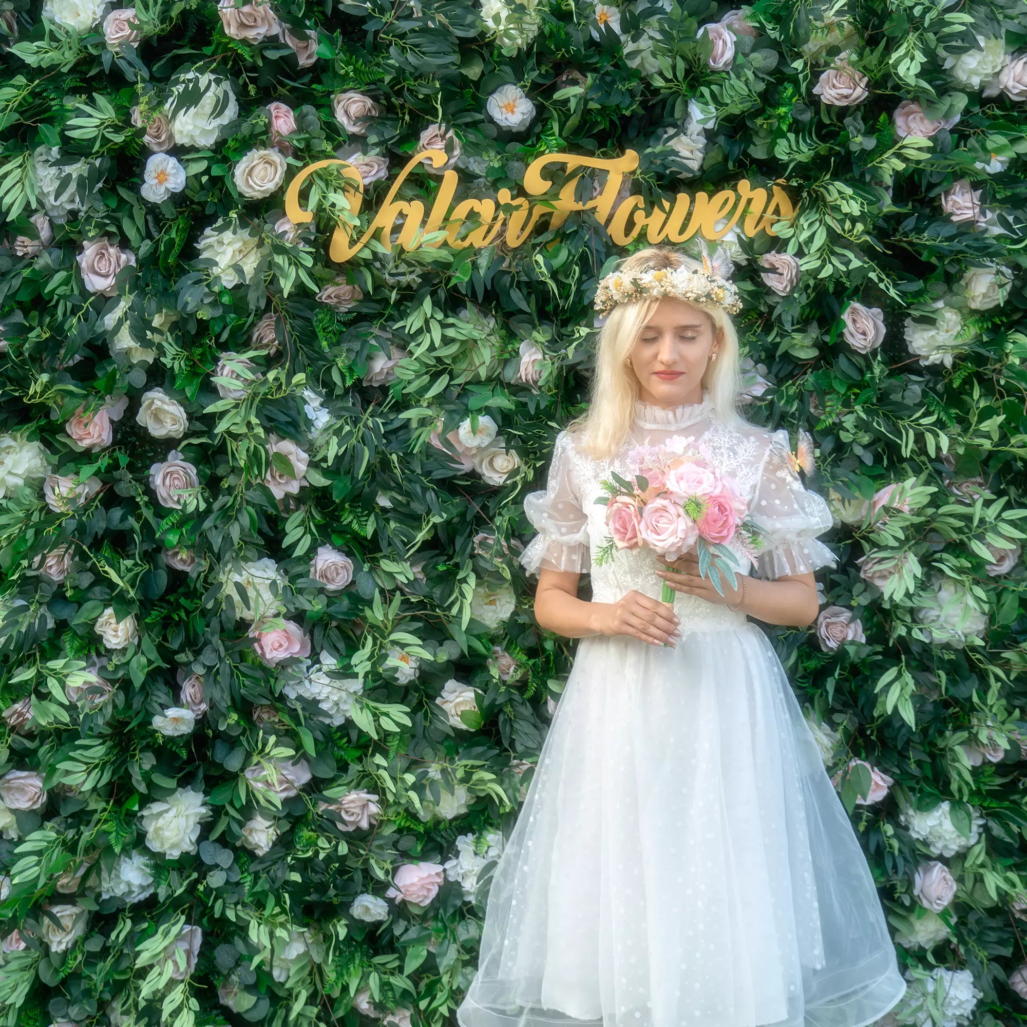 Elevate any event with the "Valar Flowers" Deluxe Floral Wall. Handcrafted with premium artificial roses, it's the ideal backdrop for memorable photos. Perfect for weddings, parties & more. Durable & UV resistant. A blend of luxury & nature's beauty.
